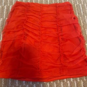 red ruched ASOS mini skirt